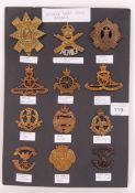 FIRST WORLD WAR CAP BADGES