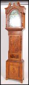 A 19th Century inlaid country oak welsh longcase clock by J Thomas of Carmarthen. The arch shaped