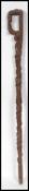 A carved wood walking stick, possibly Polynesian, the knob in the form of a stylised head, the