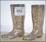 A pair of retro 20th century silver plate drinks measures in the form of boots ( see