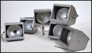 A collection of 6 vintage mid century Industrial theatre / cinema lights by Strand. Each with wall