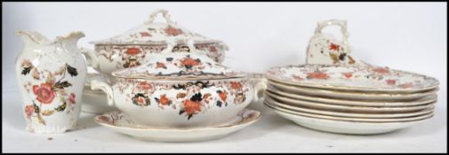 A 19th century Staffordshire service comprising tureens, graduating set of 3 meat platters, dinner