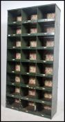 A vintage mid century Industrial sectional metal factory pigeon holes/cubby cabinet unit with