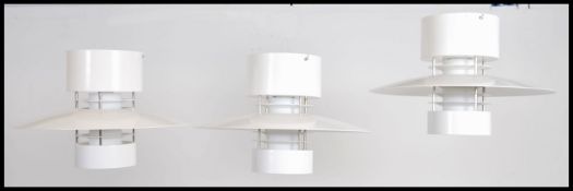 A set of 3 contemporary Industrial Glamox Luxo Aurora S ceiling lights of space age form being metal