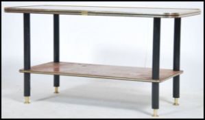 A vintage 1950's retro coffee table of rectangular form having inset backgammon style top raised
