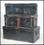 A collection of 3 Victorian metal steamer trunks to include an ebonised Victorian military