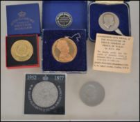 A collection of coins to include commemorative medal of the investiture of Prince Charles 1969 by