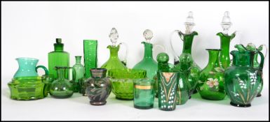 A collection of decorative green glass to include a good Mary Gregory cameo vase together with other