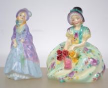 An early Royal Doulton figurine entitled ' Monica ' Rd No 762875 HN1458, Green stamps to base.