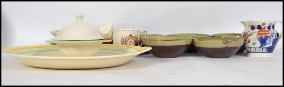 A collection of ceramics to include Deco meat platter, a set of Winchcombe pottery bowls, Carlton