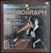 A retro 20th century wall advertising mirror for the Edison Phonograph being set within an oak