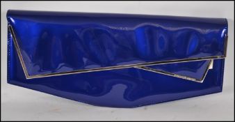 An original Alexander McQueen ladies clutch bag ( evening handbag ) of patent leather construction