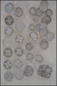 A collection of silver pre 1947 coins to include 14 young bust Victoria half crowns, various