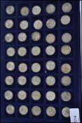 Coins - A collection of forty silver shilling coins dating from the 19th century, presented within a