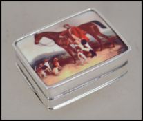 A silver pill box with inset enamel pictorial of a horse and rider ( equestrian / hunting interest )