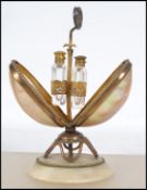 A 19th century Continental mother of pearl and gilt metal perfume bottle holder, the alabaster