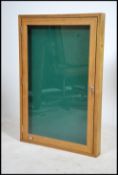 A 20th century contemporary display cabinet being wall mounted with lock and lined interior by Nobu.