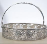 A fine 1930's Art Deco silver plate and glass basket with pierced leaf and grape decoration having