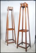 A pair of 1960's / mid century Industrial school / office coat hat stands of scaffold tapering
