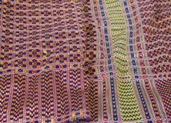 An extremely large and impressive silk textile possibly Indonesian being woven in two strips.