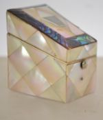 A stunning 18th / 19th century mother of pearl and abalone hinged pot. Silk lined with a central