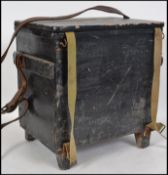 A vintage 20th century Fishing tackle box seat in ebonised wood with canvas strap. The interior
