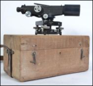 An early 20th century Hilger & Watts theodolite / dumpy level no.74949 in it's original fitted