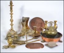 A good collection of vintage 20th century brass wares to include candle sticks, frames etc please
