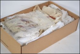 A collection of 19th century and 20th century lace doilies, cloths, trimmings etc many handmade.