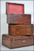 A  collection of boxes to include a 19th century Georgian mahogany inlaid caddy box together with