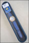 A collectable promotional cased Watch It watch from Fosters. The watch dating to 1991