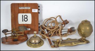 A collection of assorted vintage items to include; skipping ropes, vintage shop counter bell, a