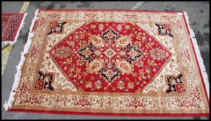 A large Iranian / Persian Keshan carpet - rug having beige ground with geometric decoration and