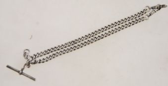 A good early 20th century silver hallmarked twin albert chain / pocket watch chain complete with t-