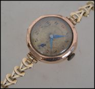 A 9ct / 375 hallmarked gold ladies cocktail dress watch, circa early 20th century being set to a