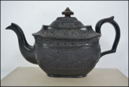 A 19th century Victorian black basalt ceramic teap