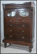 A very large Victorian Scottish mahogany chest of drawers on stand. Raised on turned legs to the