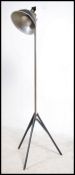 A vintage / retro floor standing lamp, converted from a Smith Victor camera light having a