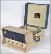 A 1960's portable Emerson Hi Fidelity  four speed two tone record player. Hinged lid lifting to