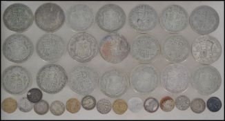 A group of 20 George V pre 1947 silver half crown coins along with a small group of pre 1947 3D