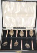 A set of six Silver guilloche enamel coffee spoons, having a London i,port mark and dating to 1913.