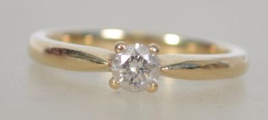 A 9ct gold and diamond ladies single stone solitaire ring. The diamond approx .25pnts in claw mount.
