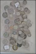 A collection of pre 1947 silver coins to include Victorian and Edwardian coins, two shilling