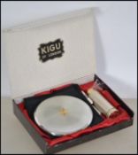 A good white metal vintage 1950's Kigu of London ladies compact and atomiser perfume spray. The