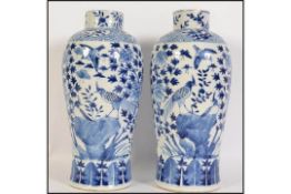 A pair of 19th century Chinese blue and white Kang