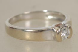 An 18ct white gold ladies single stone diamond ring approx 20pnts to the claw mounted diamond. Total