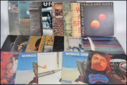 A collection of vinyl long play records from Paul McCartney, Wings and John Lennon. To include