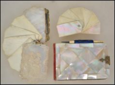 Two 19th century mother of pearl and Ivory aide memoir's together with another late 19th century