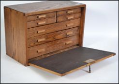 A good 20th century oak engineers / specimin chest having lockable fall front with appointed