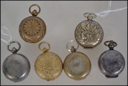 A interesting group of six sovereign cases to include brass embossed, heavily decorated, white metal